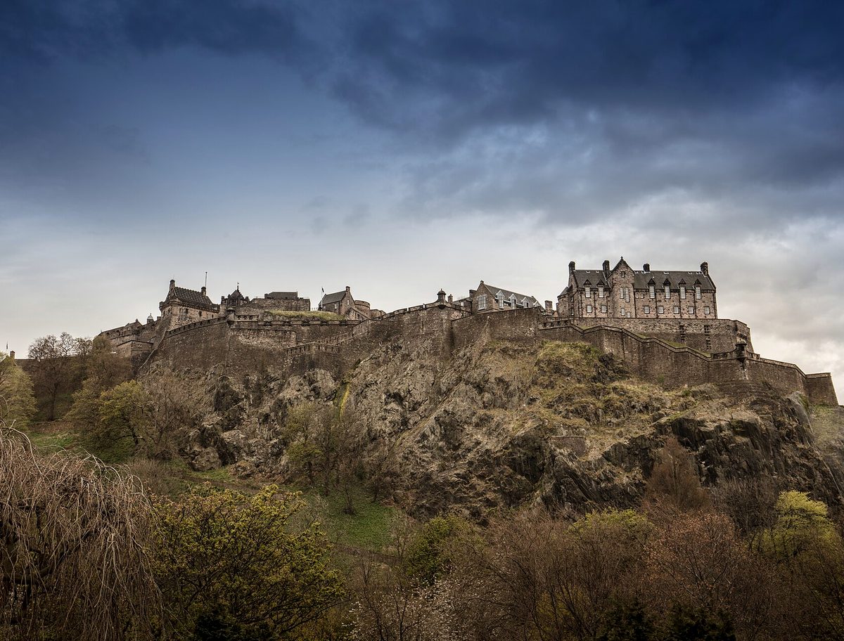 Edinburgh Castle on its rock under a stormy sky